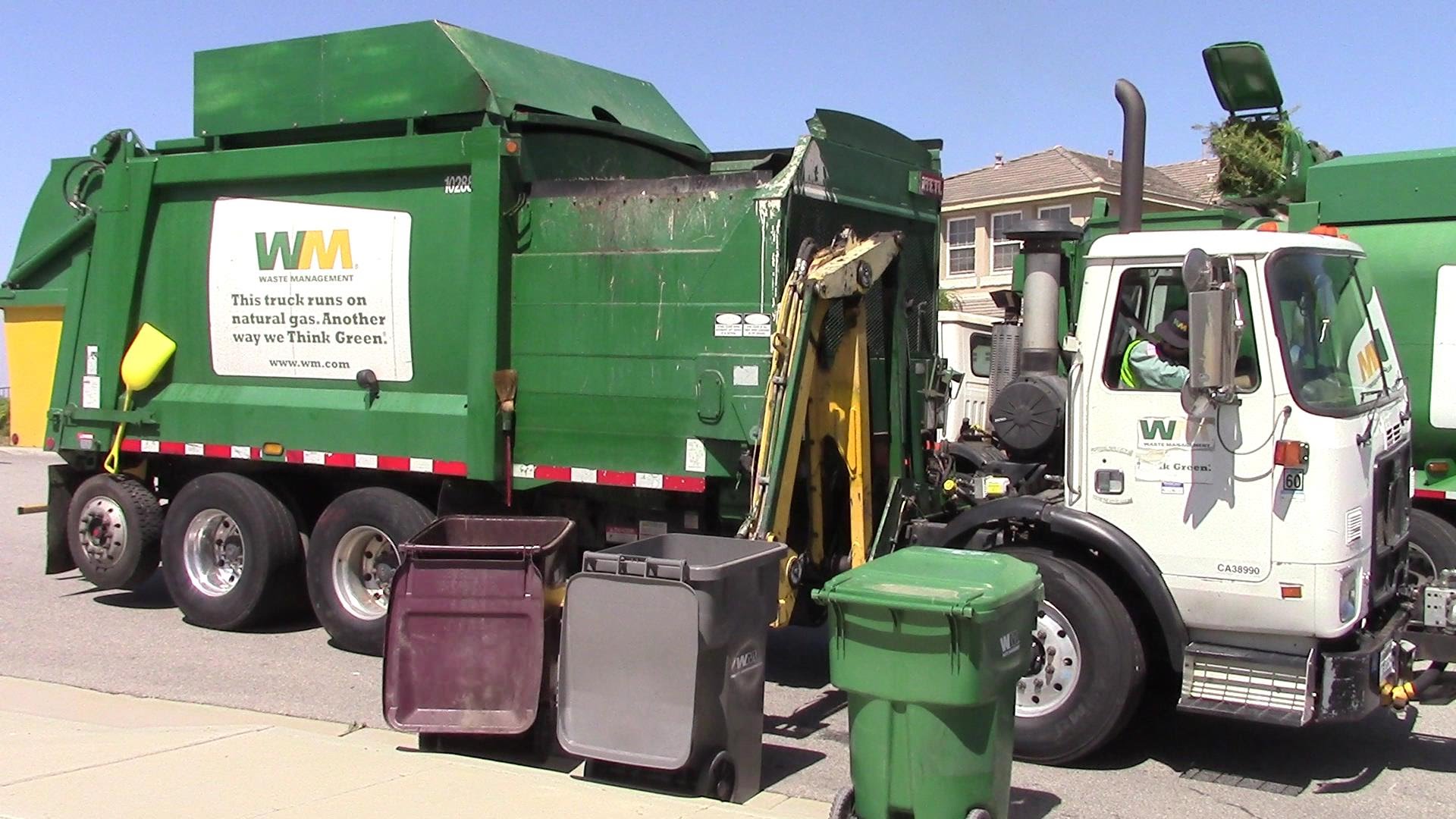 green garbage truck images